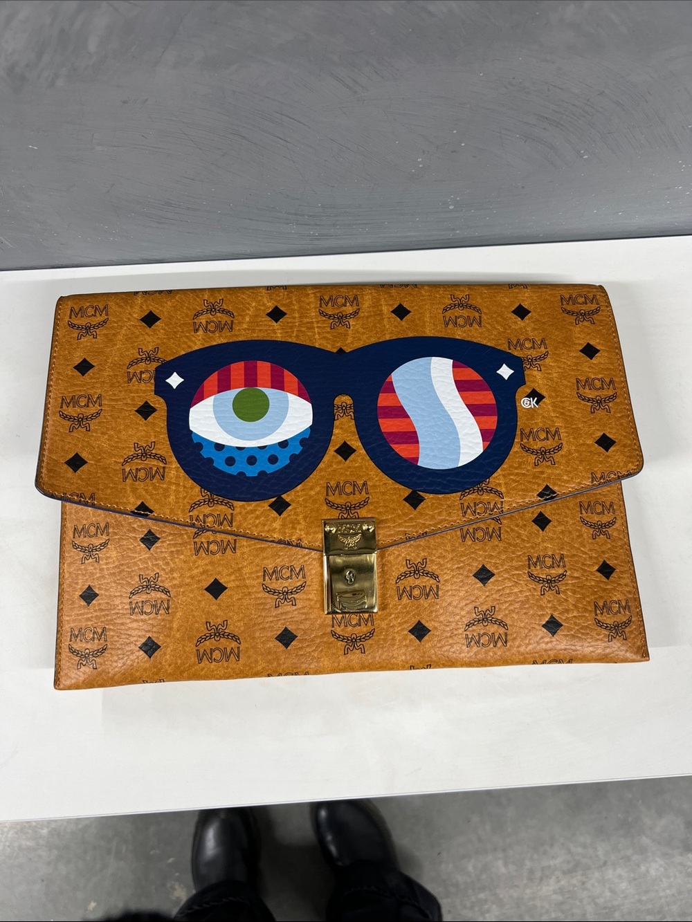 MCM Monogram Graphic Envelope Clutch